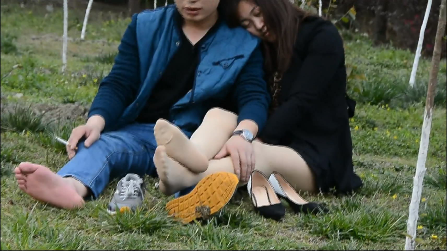 the girl with stocking nylon feet on park